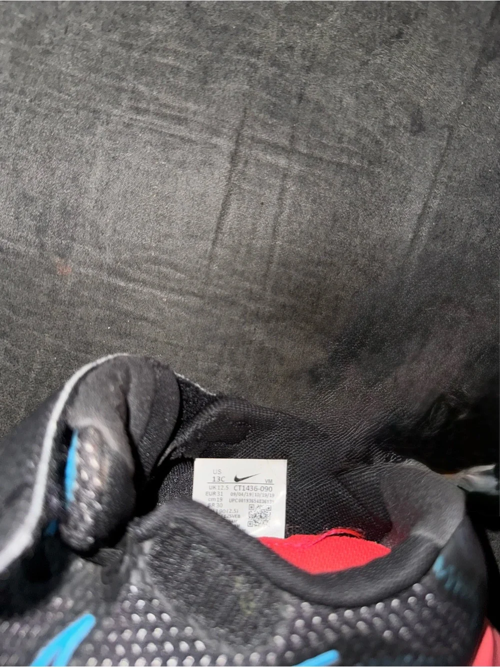 Renew Nike Kids size 13. Running Black Sneakers with Blue and neon pink .